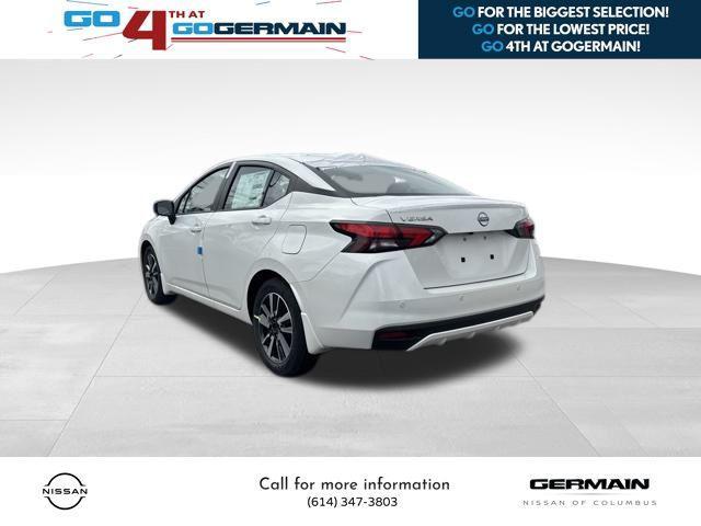 Photo of 2025 Aspen White Tricoat Nissan Versa