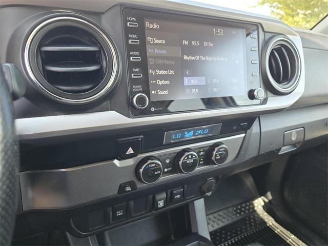 Photo of 2021 Super White Toyota Tacoma