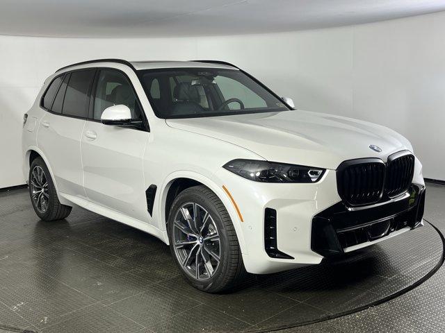 Photo of 2026 Mineral White Metallic BMW X5 PHEV