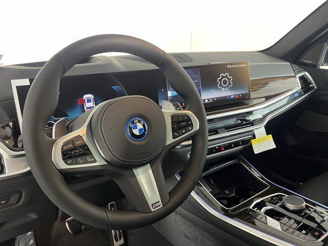 Photo of 2026 Mineral White Metallic BMW X5 PHEV
