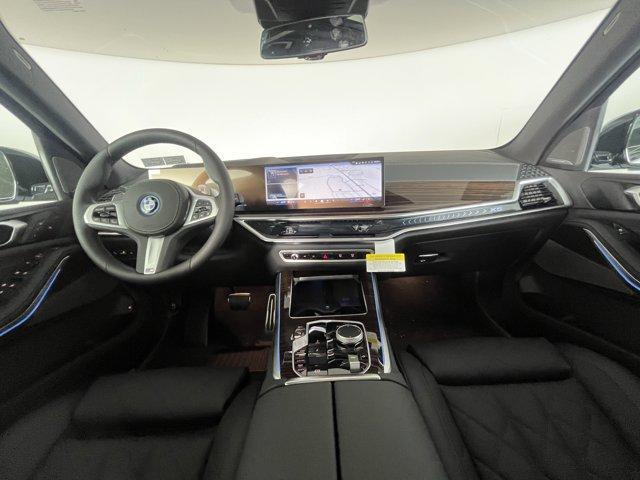 Photo of 2026 Mineral White Metallic BMW X5 PHEV