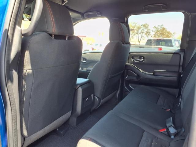 Photo of 2024 Bluestone Pearl Nissan Frontier