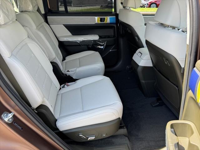Photo of 2025 Earthy Brass Matte Hyundai SANTA FE HEV