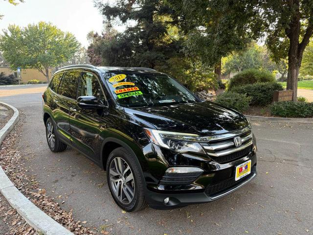 Photo of 2017 Black Honda Pilot