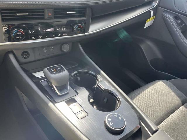 Photo of 2026 Scarlet Ember Tintcoat Nissan Rogue