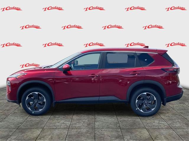 Photo of 2026 Scarlet Ember Tintcoat Nissan Rogue