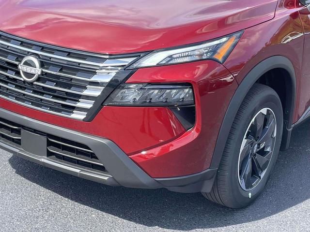 Photo of 2026 Scarlet Ember Tintcoat Nissan Rogue