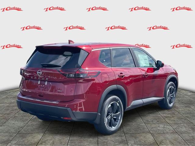 Photo of 2026 Scarlet Ember Tintcoat Nissan Rogue