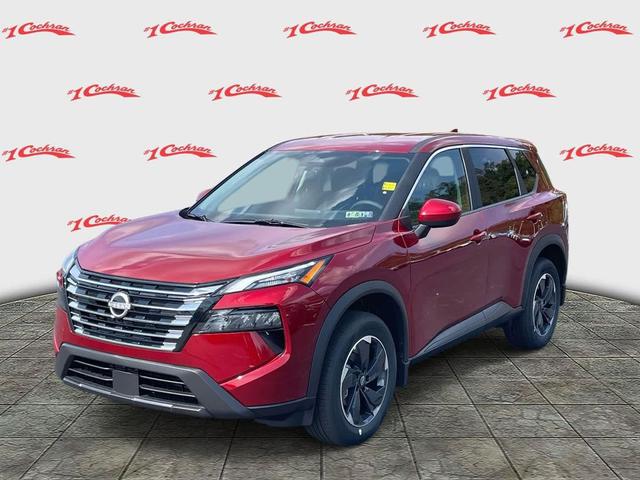 Photo of 2026 Scarlet Ember Tintcoat Nissan Rogue