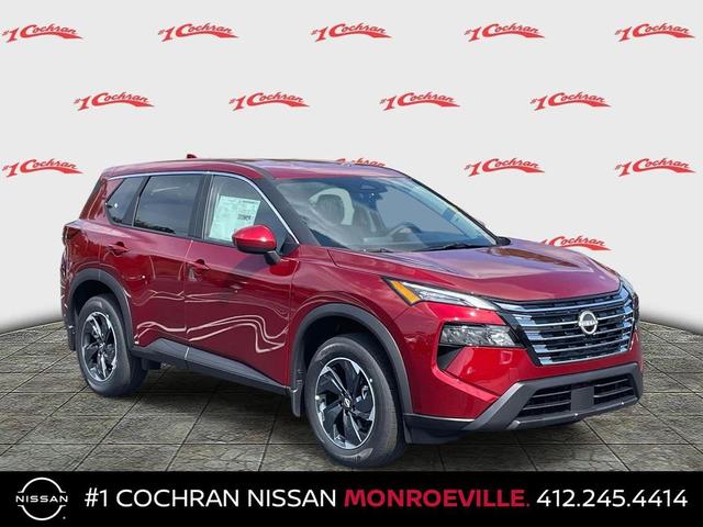 Photo of 2026 Scarlet Ember Tintcoat Nissan Rogue