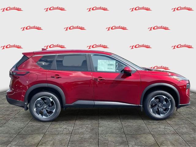 Photo of 2026 Scarlet Ember Tintcoat Nissan Rogue