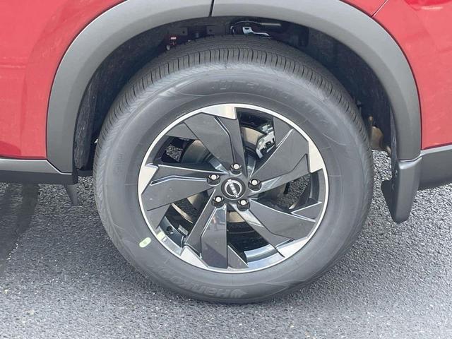 Photo of 2026 Scarlet Ember Tintcoat Nissan Rogue