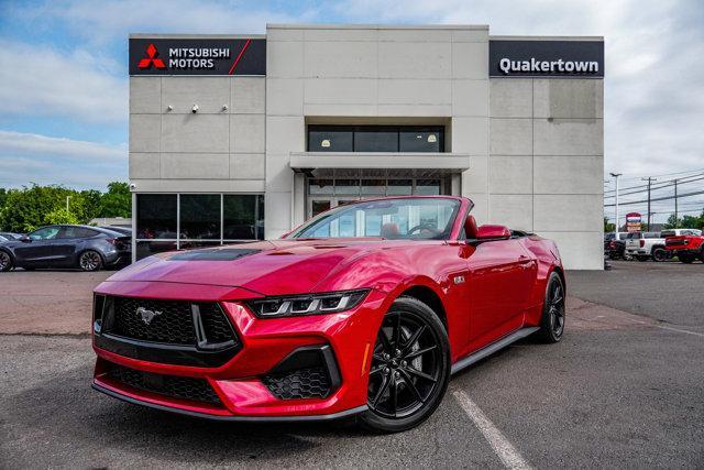 Photo of 2024 Rapid Red Metallic Tinted Clearcoat Ford Mustang