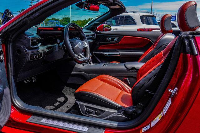 Photo of 2024 Rapid Red Metallic Tinted Clearcoat Ford Mustang