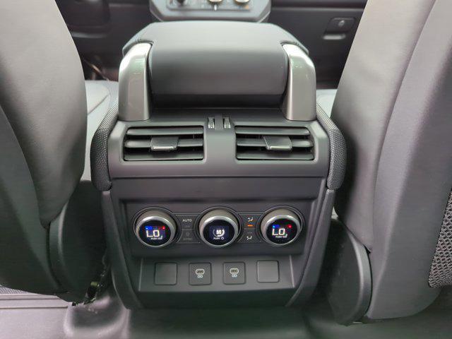 Photo of 2024 Santorini Black Metallic Land Rover Defender