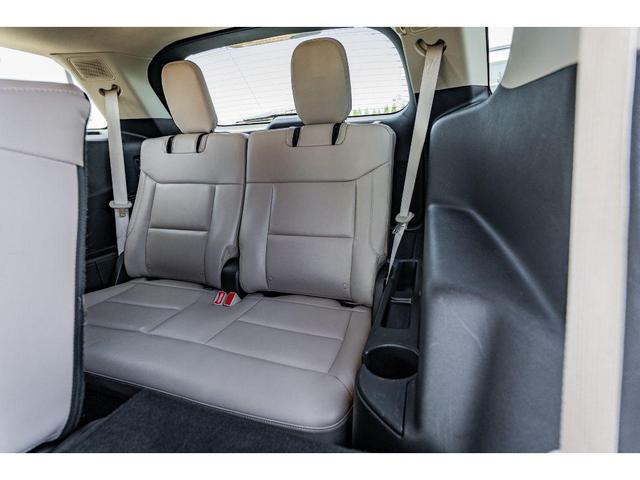 Photo of 2024 Rapid Red Metallic Tinted Clearcoat Ford Explorer