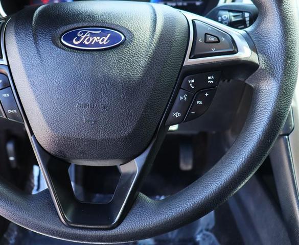 Photo of 2017 Ingot Silver Ford Fusion Hybrid