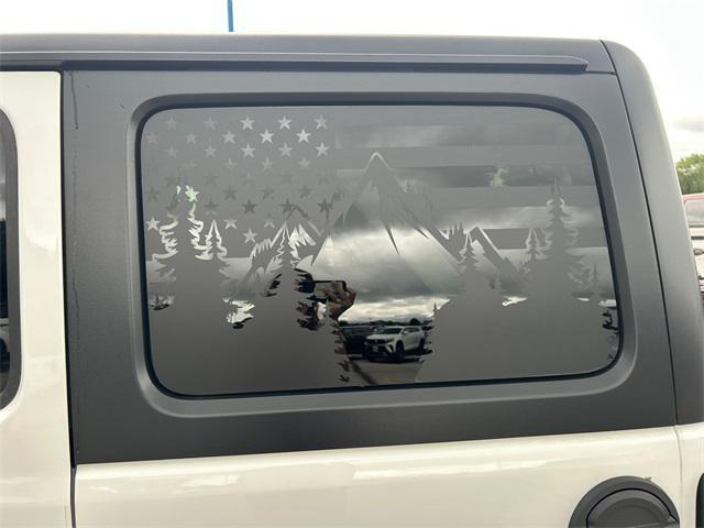 Photo of 2018 Bright White Clearcoat Jeep Wrangler Unlimited