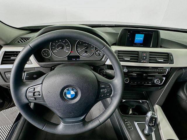 Photo of 2018 Jet Black BMW 320