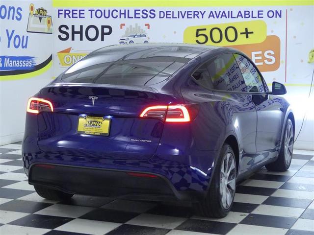 Photo of 2022 Deep Blue Metallic Tesla Model Y