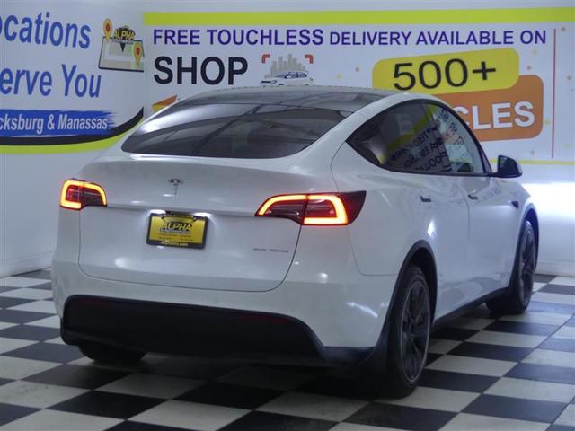 Photo of 2021 Pearl White Multi-Coat Tesla Model Y