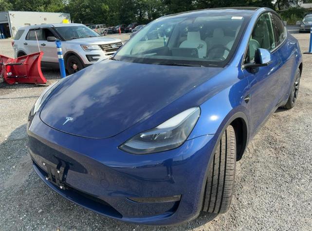 Photo of 2023 Deep Blue Metallic Tesla Model Y