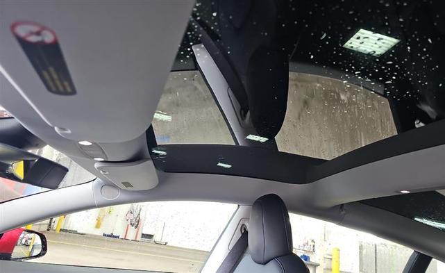 Photo of 2021 Red Multi-Coat Tesla Model 3