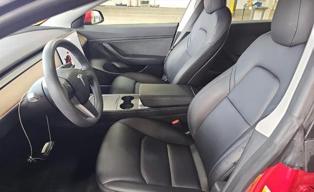 Photo of 2021 Red Multi-Coat Tesla Model 3