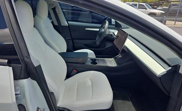Photo of 2021 Pearl White Multi-Coat Tesla Model 3