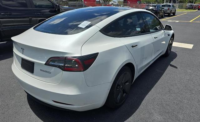 Photo of 2021 Pearl White Multi-Coat Tesla Model 3