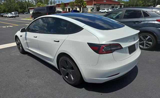 Photo of 2021 Pearl White Multi-Coat Tesla Model 3