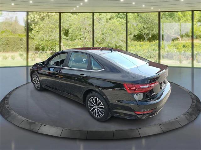 Photo of 2021 Black Uni Volkswagen Jetta