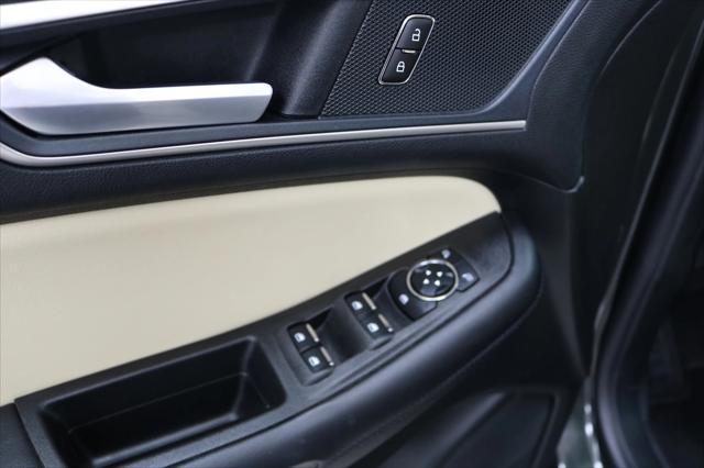 Photo of 2024 FORGED GREEN Ford Edge