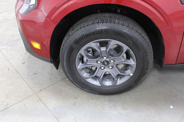 Photo of 2025 Ruby Red Metallic Tinted Clearcoat Ford Maverick