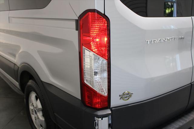 Photo of 2020 Ingot Silver Metallic Ford Transit-150