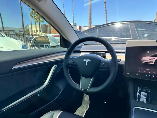 Photo of 2023 Pearl White Multi-Coat Tesla Model 3