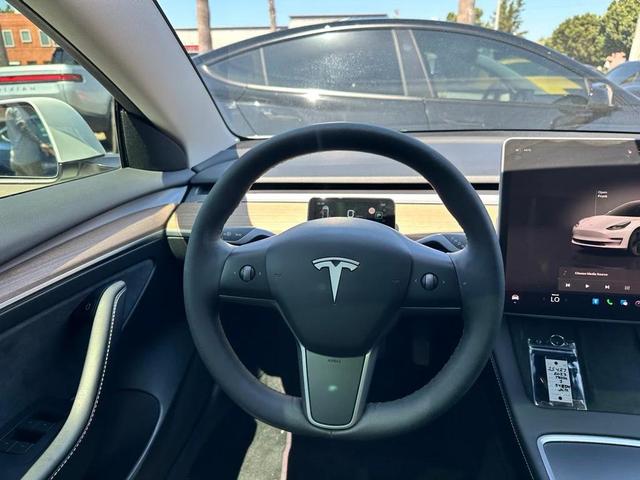 Photo of 2023 Pearl White Multi-Coat Tesla Model 3