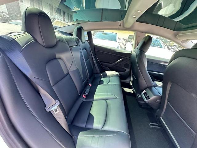Photo of 2023 Pearl White Multi-Coat Tesla Model 3