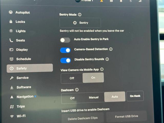 Photo of 2023 Pearl White Multi-Coat Tesla Model 3