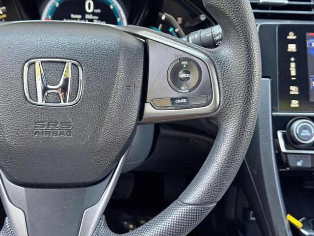 Photo of 2018 White Orchid Pearl Honda Civic