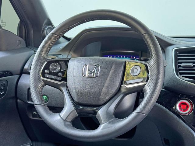 Photo of 2020 Black Forest Pearl Honda Passport