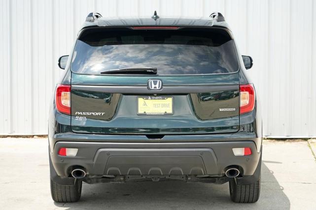 Photo of 2020 Black Forest Pearl Honda Passport
