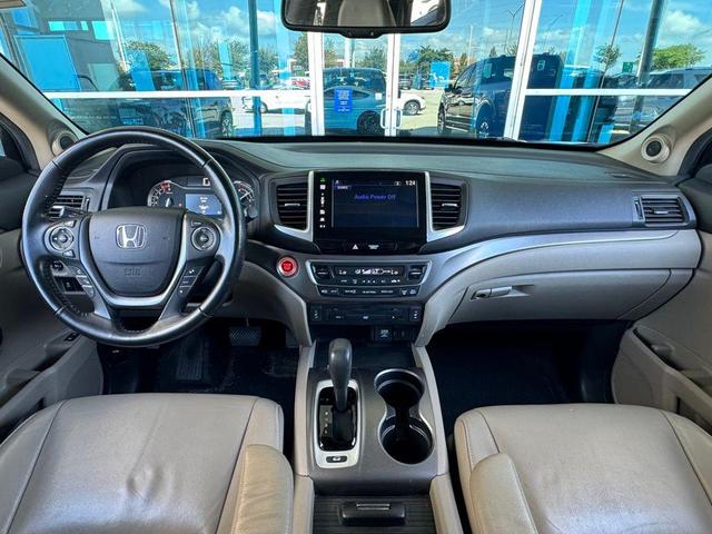 Photo of 2016 Dark Cherry Pearl Honda Pilot