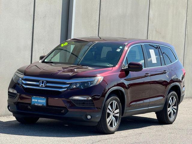 Photo of 2016 Dark Cherry Pearl Honda Pilot