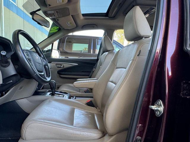 Photo of 2016 Dark Cherry Pearl Honda Pilot