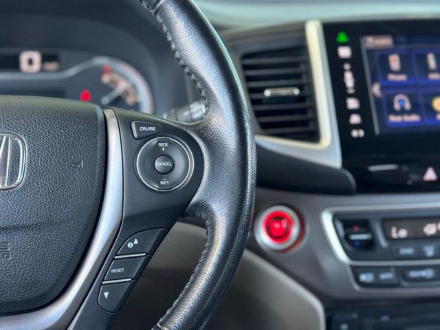 Photo of 2016 Dark Cherry Pearl Honda Pilot