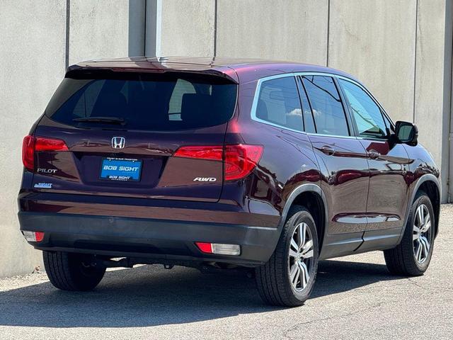 Photo of 2016 Dark Cherry Pearl Honda Pilot