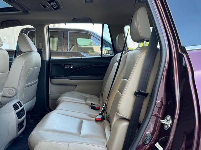 Photo of 2016 Dark Cherry Pearl Honda Pilot