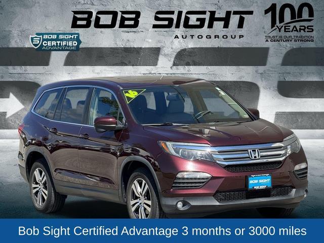 Photo of 2016 Dark Cherry Pearl Honda Pilot
