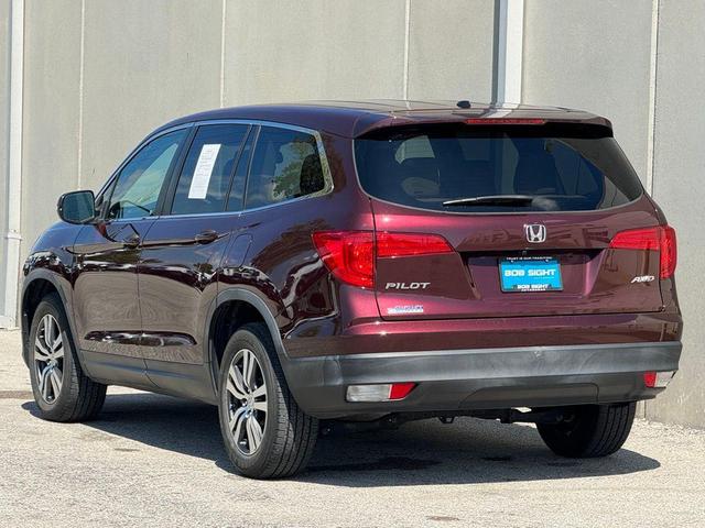 Photo of 2016 Dark Cherry Pearl Honda Pilot